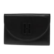 Pre-owned Leather clutches Hermès Vintage , Black , Dames