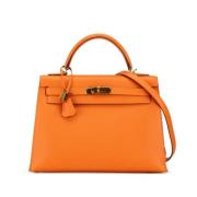 Pre-owned Leather handbags Hermès Vintage , Orange , Dames