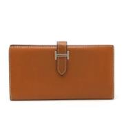 Pre-owned Leather wallets Hermès Vintage , Brown , Dames