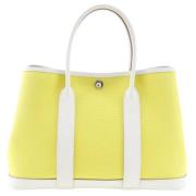 Pre-owned Canvas handbags Hermès Vintage , Yellow , Dames