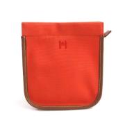 Pre-owned Cotton clutches Hermès Vintage , Orange , Dames