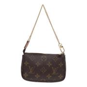 Pre-owned Canvas clutches Louis Vuitton Vintage , Brown , Dames