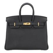 Pre-owned Leather handbags Hermès Vintage , Black , Dames