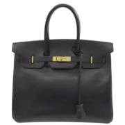 Pre-owned Leather handbags Hermès Vintage , Black , Dames