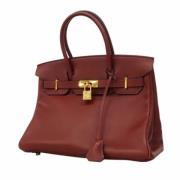 Pre-owned Leather handbags Hermès Vintage , Red , Dames