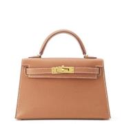 Pre-owned Leather handbags Hermès Vintage , Brown , Dames