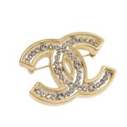 Pre-owned Metal brooches Chanel Vintage , Yellow , Dames