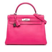 Pre-owned Leather handbags Hermès Vintage , Pink , Dames