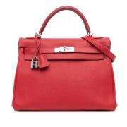 Pre-owned Leather handbags Hermès Vintage , Red , Dames