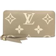 Pre-owned Leather wallets Louis Vuitton Vintage , Beige , Dames