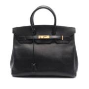 Pre-owned Leather handbags Hermès Vintage , Black , Dames