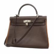 Pre-owned Leather handbags Hermès Vintage , Brown , Dames