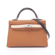 Pre-owned Leather handbags Hermès Vintage , Brown , Dames