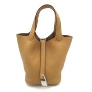 Pre-owned Leather handbags Hermès Vintage , Beige , Dames