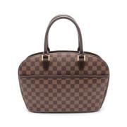 Pre-owned Canvas handbags Louis Vuitton Vintage , Brown , Dames