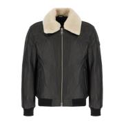 Stijlvolle jassen voor mannen en vrouwen Moose Knuckles , Black , Here...