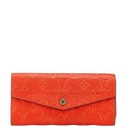 Pre-owned Leather wallets Louis Vuitton Vintage , Orange , Dames