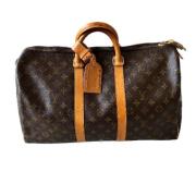 Pre-owned Canvas travel-bags Louis Vuitton Vintage , Brown , Dames