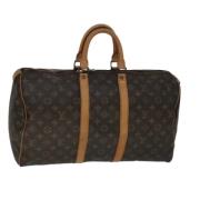 Pre-owned Canvas travel-bags Louis Vuitton Vintage , Brown , Dames