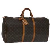 Pre-owned Canvas travel-bags Louis Vuitton Vintage , Brown , Dames