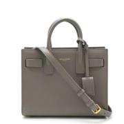 Pre-owned Leather handbags Yves Saint Laurent Vintage , Gray , Dames