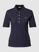 Poloshirt van katoen met labeldetail