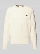 Gebreide pullover met logopatch