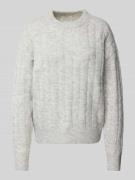 Gebreide pullover met kabelpatroon