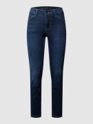 Stone-washed skinny fit jeans