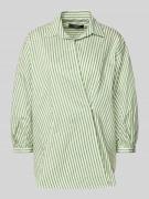 Relaxed fit wikkelblouse van een mix van katoen en zijde, model 'CECI'