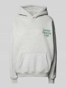 Oversized hoodie met statementprint, model 'Sunday Running Club'