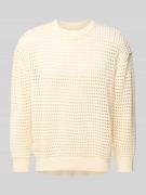 Gebreide pullover met ajourpatroon