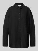 Blouse met extra brede schouders en borstzak