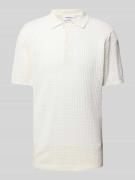 Relaxed fit poloshirt met knoopsluiting