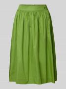 Knielange rok met labeldetail