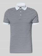 Slim fit poloshirt van een mix van katoen en elastaan