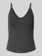 Top met bandjes en V-hals.