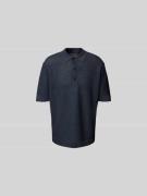 Relaxed fit poloshirt in gebreide look