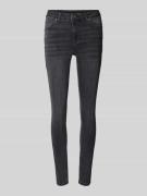 Skinny fit jeans met achterzakken
