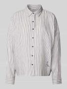 Oversized overhemdblouse met motiefstitching, model 'Ruby'