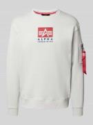 Sweatshirt met ritszak op de mouw