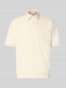 Oversized poloshirt met polokraag en labeldetail