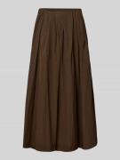 Midirok in geplooide look