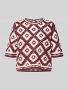 Gehaakte, gebreide top in semi-transparant design