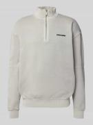 Oversized sweatshirt met korte ritssluiting