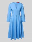 Knielange jurk met steekzakken, model 'DISCO'