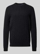 Gebreide pullover met ribboorden
