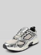 Lage sneakers met metallic garnering