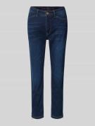 Stone-washed skinny fit jeans