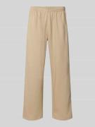 Wide fit sweatpants met elastische band